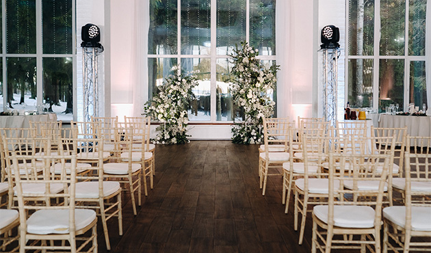 Elegant wedding venue with romantic lighting and floral arrangements